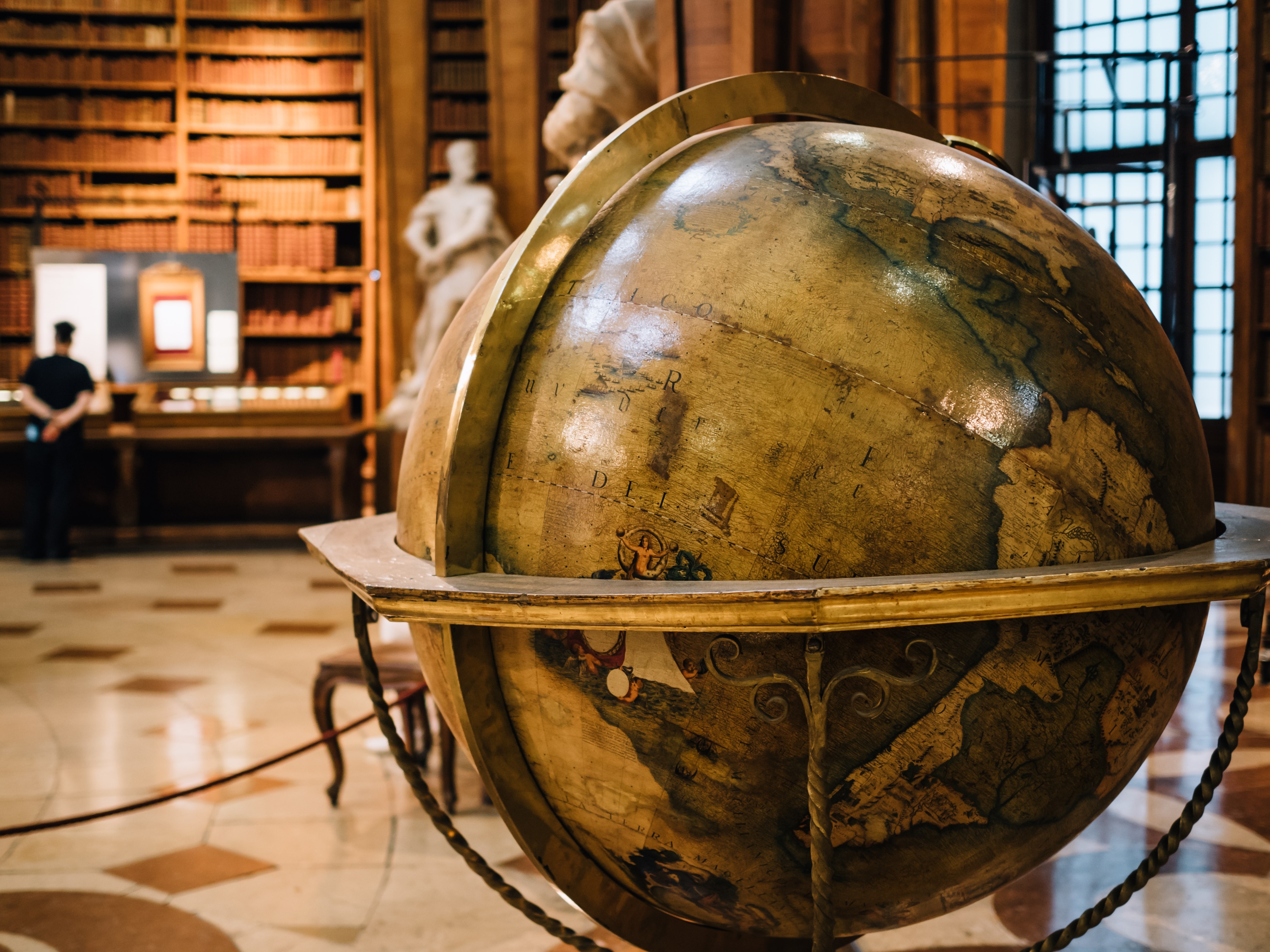 a globe at the State Hall of the Austrian National Library